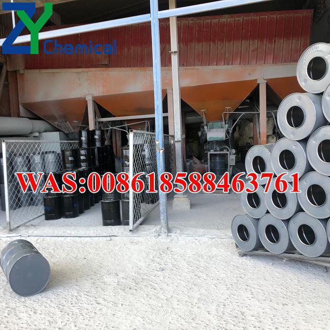 Quality control inspection of calcium carbide crystals at factory in Ordos Inner Mongolia with 6000 tons monthly output
